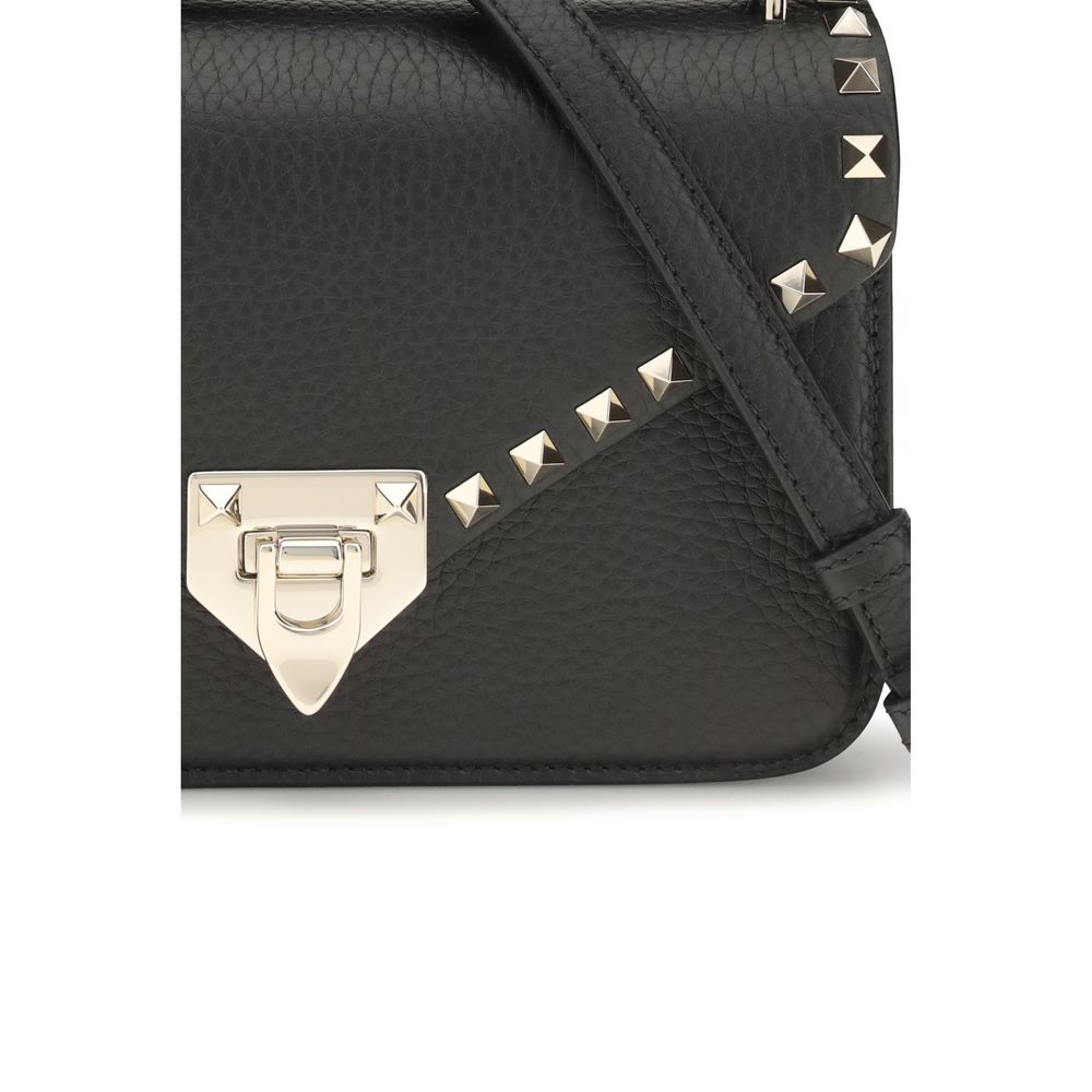 Mini Shoulder Bag by Valentino Garavani for women in bio-acetate cotton & bos taurus calfskin leather black & signature features a effortless chic silhouette with a secure hook, ample , and versatile shoulder-strap & adjustable-strap for a effortless chic finish.