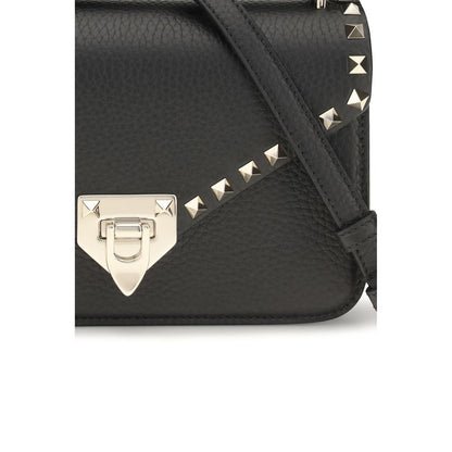 Mini Shoulder Bag by Valentino Garavani for women in bio-acetate cotton & bos taurus calfskin leather black & signature features a effortless chic silhouette with a secure hook, ample , and versatile shoulder-strap & adjustable-strap for a effortless chic finish.