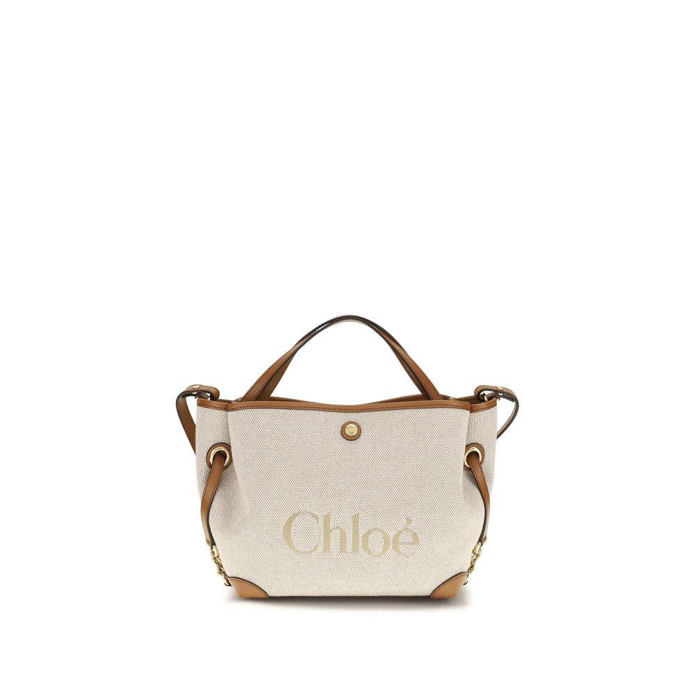 Shoulder Bag by Chloé for women in modal & cotton beige & jacquard features a effortless sophistication silhouette, secured by a magnetic & button with ample and versatile shoulder-strap, handle & adjustable-strap for a effortless sophistication finish.