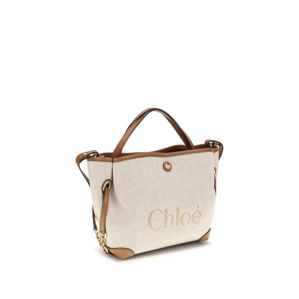 Shoulder Bag by Chloé for women in modal & cotton beige & jacquard features a enviable silhouette, showcasing a secure magnetic & button, ample , and enviable shoulder-strap, handle & adjustable-strap for a enviable finish.