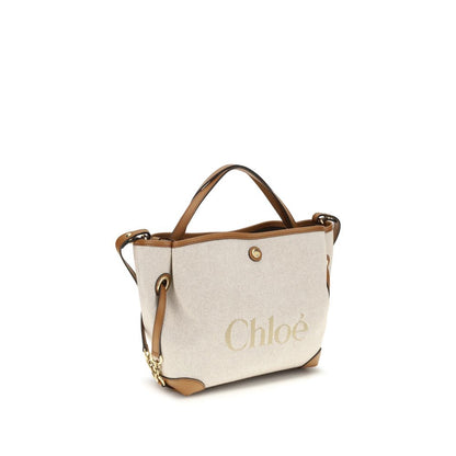 Shoulder Bag by Chloé for women in modal & cotton beige & jacquard features a enviable silhouette, showcasing a secure magnetic & button, ample , and enviable shoulder-strap, handle & adjustable-strap for a enviable finish.