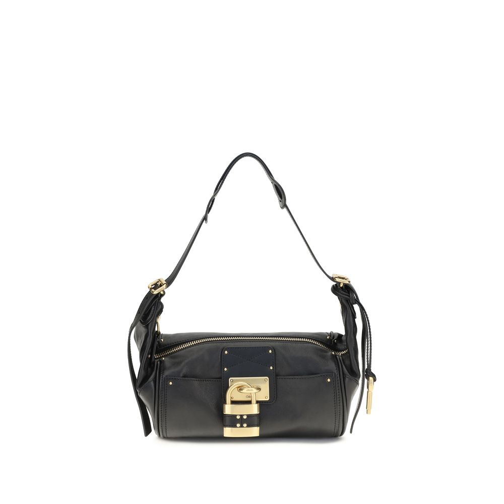Small Shoulder Bag by Chloé for women in bos taurus calf leather black & signature features a enviable silhouette, showcasing a secure zipper & buckle, ample , and enviable shoulder-strap for a enviable finish.