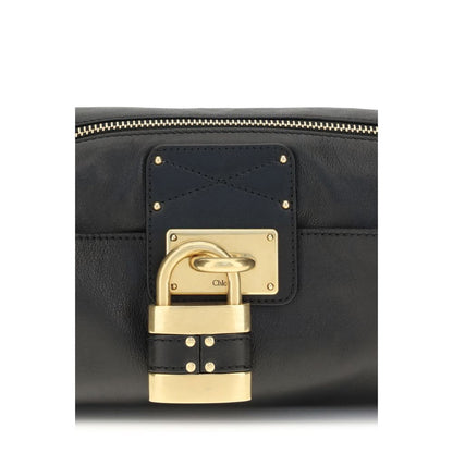 Small Shoulder Bag by Chloé for women in bos taurus calf leather black & signature features an effortlessly chic silhouette with a secure zipper & buckle, ample , and versatile shoulder-strap for effortlessly chic everyday luxury.