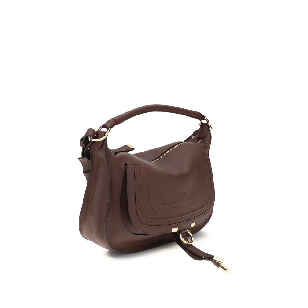 Compact 2-in-1 Shoulder & Crossbody Flap Satchel Bag by Chloé for women in bos taurus calf leather signature showcases a enviable silhouette, artfully detailed with a secure flap & zipper, organized external-pockets, and versatile crossbody-strap, shoulder-strap & adjustable-strap for a enviable look.