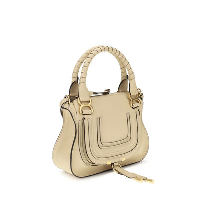Flap Shoulder Bag by Chloé for women in bos taurus calf leather beige, signature & monogram features an effortlessly chic silhouette with a secure flap & zipper, ample external-pockets, and versatile shoulder-strap, handle & adjustable-strap for effortlessly chic everyday luxury.