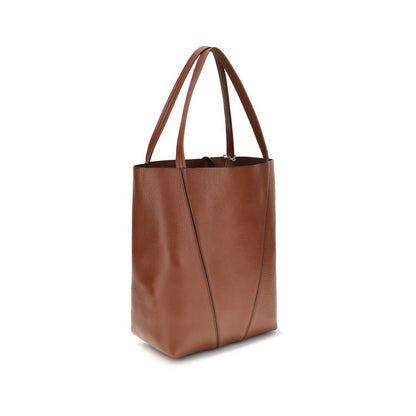 Shoulder Bag by Chloé for women in bos taurus calf grained leather brown & monogram features an effortlessly chic silhouette with a secure , ample single-compartment, and versatile shoulder-strap & handle for effortlessly chic everyday luxury.