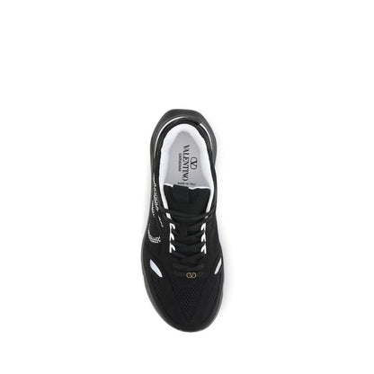 Athletic Sneakers by Valentino Garavani for men in suede leather black, gold, signature-print & print features an effortless chic silhouette, showcasing the signature low-top style of the V Logo Men's Low Top Suede Leather Athletic Sneakers collection with a truly effortless chic finish.
