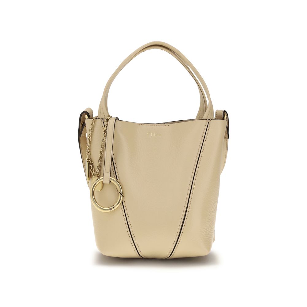 Shoulder Bag by Chloé for women in bos taurus grained leather beige, monogram & print features a distinguished silhouette, showcasing a secure magnetic & button and distinguished single-compartment with versatile shoulder-strap, handle & adjustable-strap for a distinguished finish.