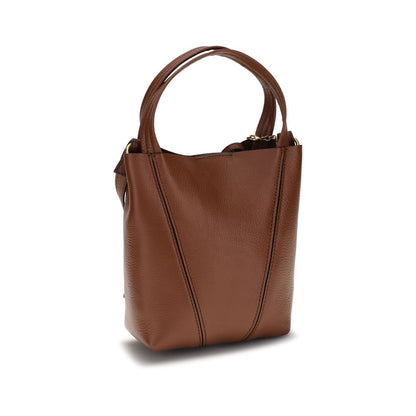 Shoulder Bag by Chloé for women in bos taurus grained leather brown & monogram presents a versatile silhouette, showcasing a secure magnetic & button and versatile single-compartment with versatile shoulder-strap, handle & adjustable-strap for a sophisticated look.