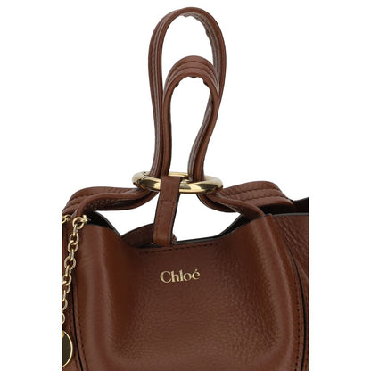 Shoulder Bag by Chloé for women in bos taurus grained leather brown & monogram features a effortless sophistication silhouette, secured by a magnetic & button with ample single-compartment and versatile shoulder-strap, handle & adjustable-strap for a effortless sophistication finish.