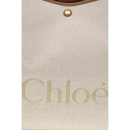 Large Shoulder Tote Bag by Chloé for women in cotton canvas beige & jacquard features a effortless chic silhouette with a secure , ample , and versatile handle for a effortless chic finish.