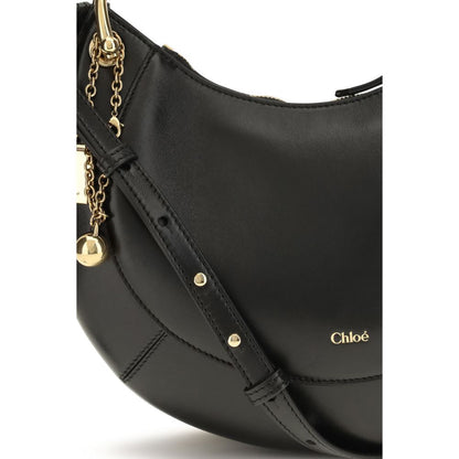 Shoulder Bag by Chloé for women in bio-acetate cotton & bos taurus calf leather black & signature features an effortlessly chic silhouette with a secure buckle, ample cardholder, and versatile shoulder-strap & adjustable-strap for effortlessly chic everyday luxury.