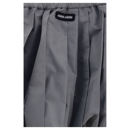 Skirt by Miu Miu for women in polyester gray features an relaxed-yet-refined silhouette that elegantly showcases the Women's Polyester Mini Skirt design and sophisticated mini.