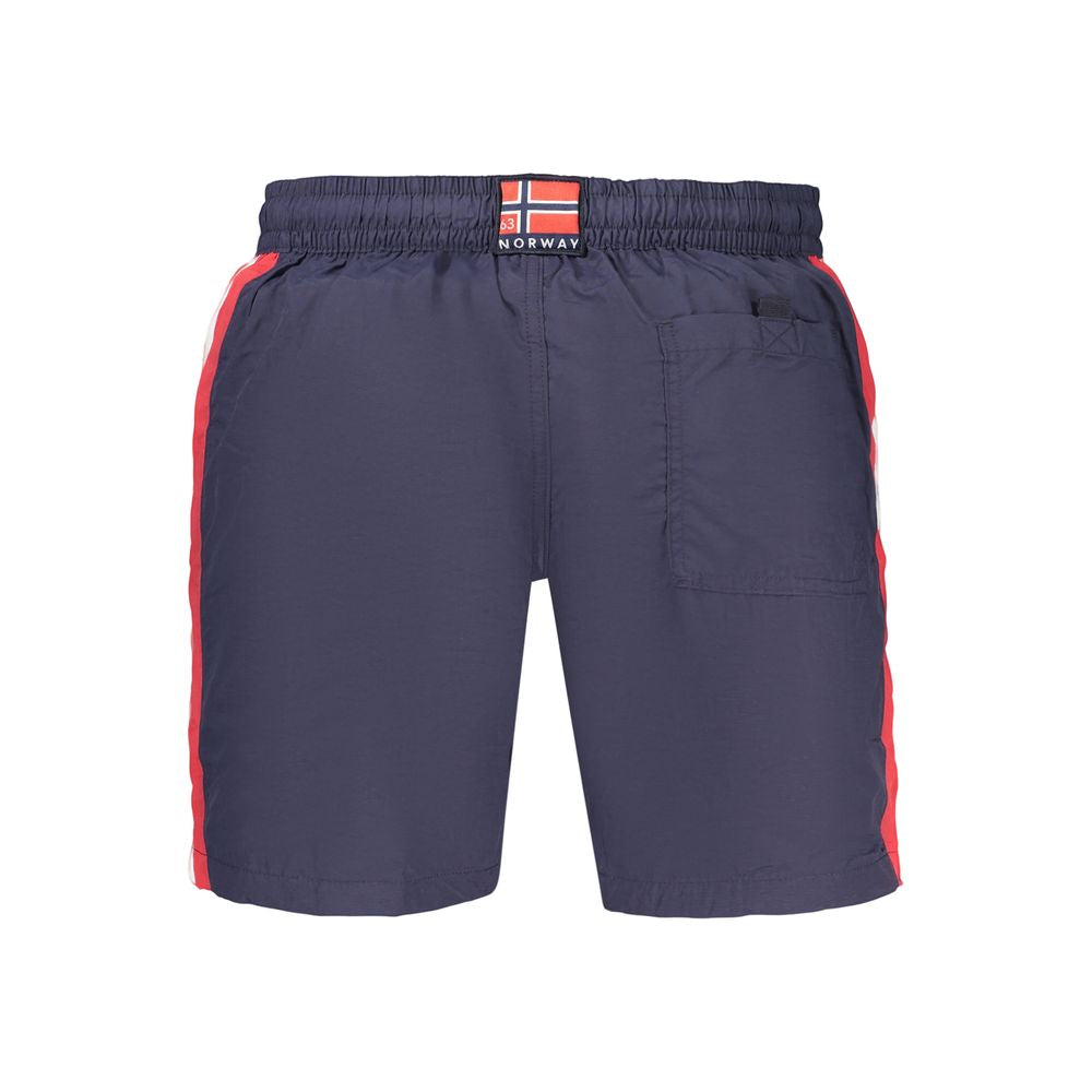 Swim Shorts by Norway 1963 for men in polyamide blue, red, white, signature & print presents a sculptural silhouette, showcasing the sculptural Men's Polyamide Swim Shorts design with a refined cut for a premium, sophisticated look.