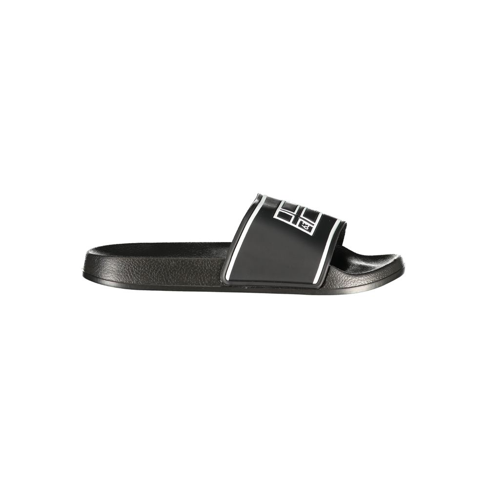Slippers by Norway 1963 for men in polyethylene black, white & print presents a effortless silhouette, showcasing the elegant Men's Polyethylene Slippers design with its unique and sophisticated .