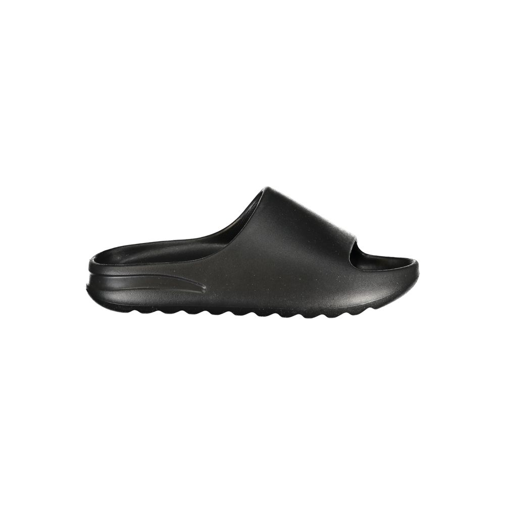 Sandals by Norway 1963 for men in polyethylene black & print presents a sculptural silhouette, showcasing the Men's Polyethylene Sandals design with a sculptural and for a premium look.