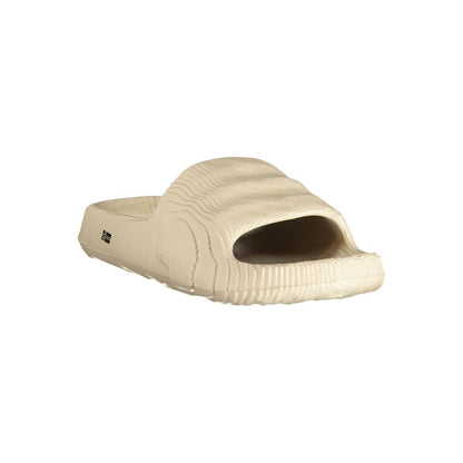Slippers by Norway 1963 for men in polyurethane beige & print features an effortless chic Men's Polyurethane Slippers aesthetic, defined by a and a refined .