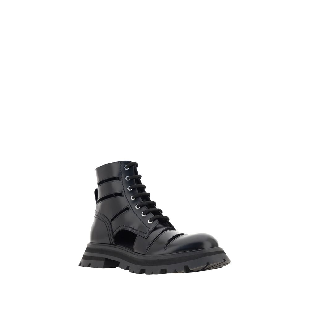 Lace-Up Ankle Combat Cut-Out Boots by Alexander McQueen for women in bos taurus calfskin leather black & patterned features an dynamic silhouette, showcasing the dynamic Wander Women's Bos Taurus Calfskin Leather Lace-Up Ankle Combat Cut-Out Boots design with its distinctive and elegant .