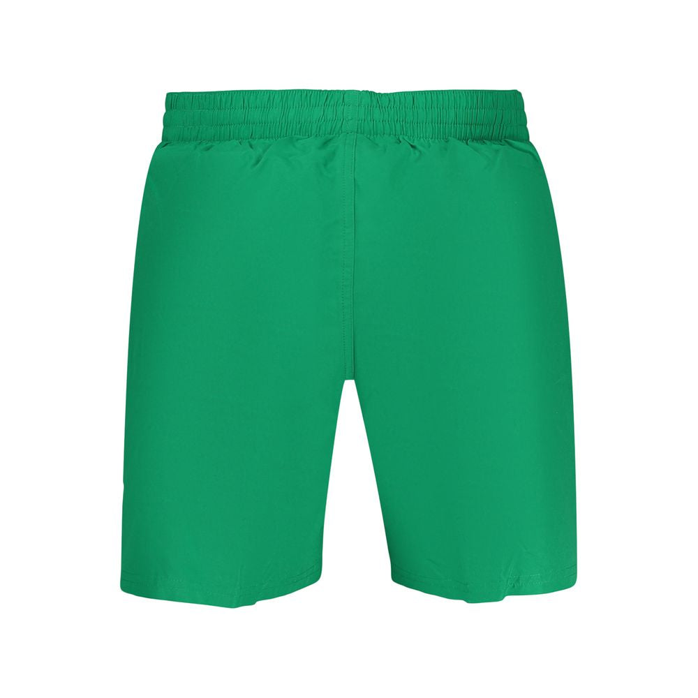 Swim Shorts by Nike for men in polyester green features an glamourous silhouette from the Waves Men's Polyester Swim Shorts collection, highlighting a refined fit and glamourous cut for a premium poolside look.