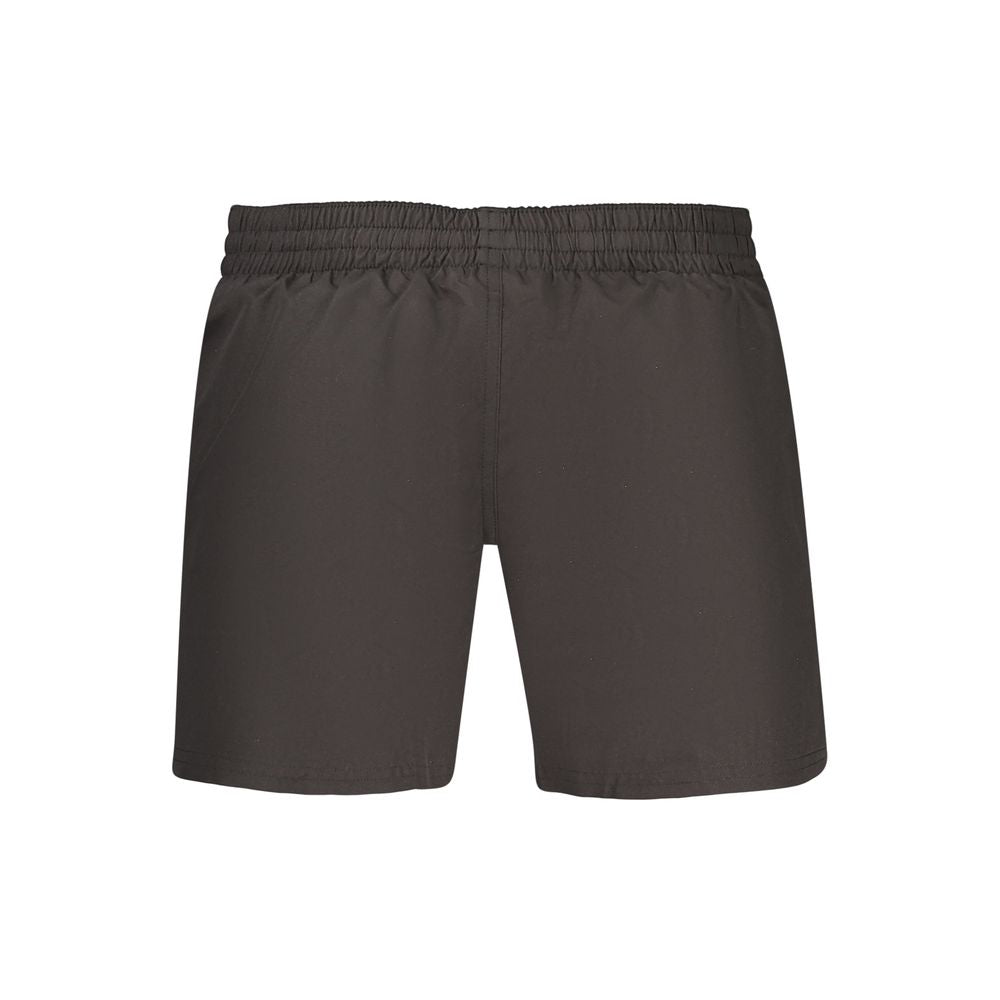 Swim Shorts by Nike for men in polyester and black showcases a sinuous silhouette, expertly cut for a sinuous fit as part of the Waves Men's Polyester Swim Shorts collection.