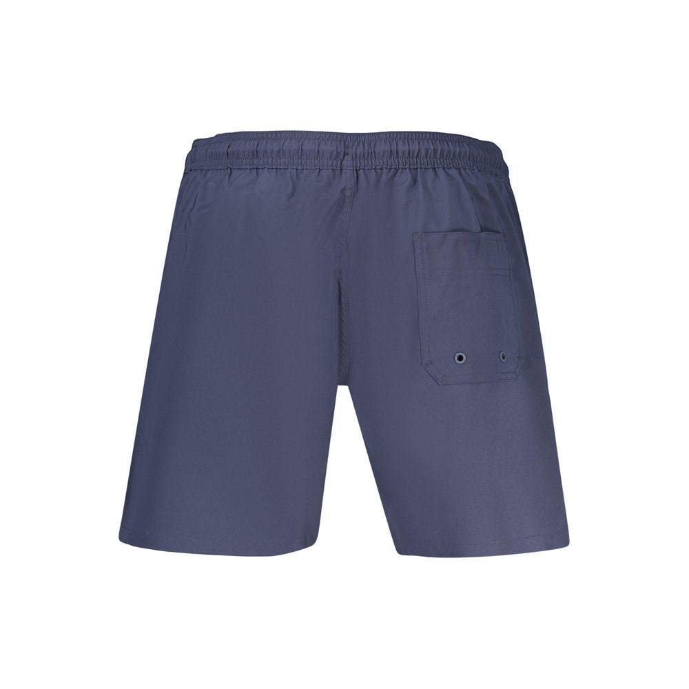 Swim Shorts by Calvin Klein for men in stretch polyester blue features an dramatic silhouette that defines the luxurious aesthetic and refined cut of the Waves Men's Stretch Polyester Swim Shorts.