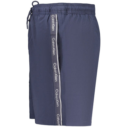 Swim Shorts by Calvin Klein for men in stretch polyester and blue showcases a sinuous silhouette, expertly cut for a sinuous fit as part of the Waves Men's Stretch Polyester Swim Shorts collection.