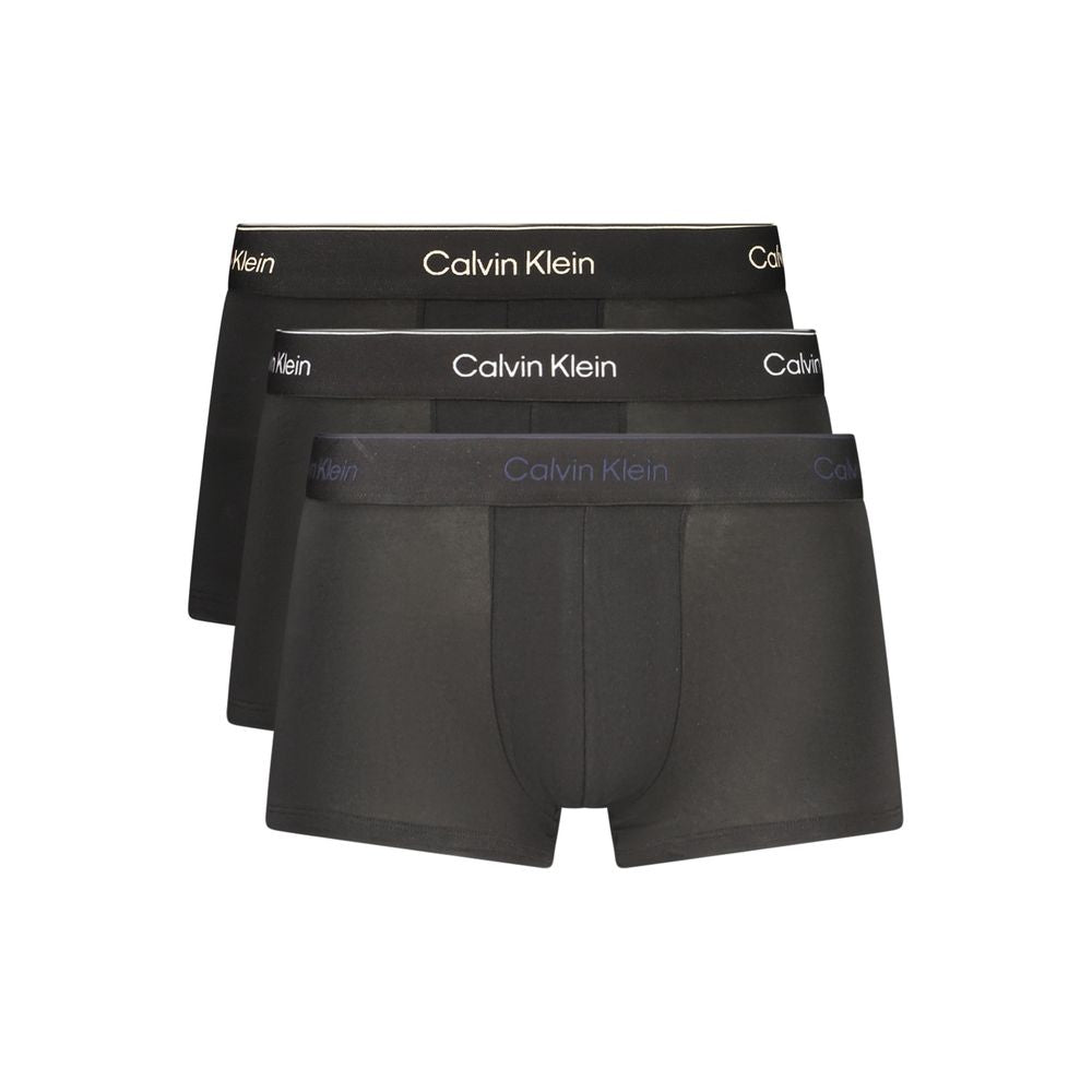 Underwear Boxer Shorts by Calvin Klein for men in stretch cotton black, blue, white & print presents a subtle silhouette as Men's Low-Rise Stretch Cotton Underwear Boxer Shorts, expertly tailored with a subtle fit for a premium look.