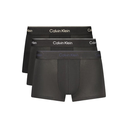 Underwear Boxer Shorts by Calvin Klein for men in stretch cotton black, blue, white & print presents a subtle silhouette as Men's Low-Rise Stretch Cotton Underwear Boxer Shorts, expertly tailored with a subtle fit for a premium look.