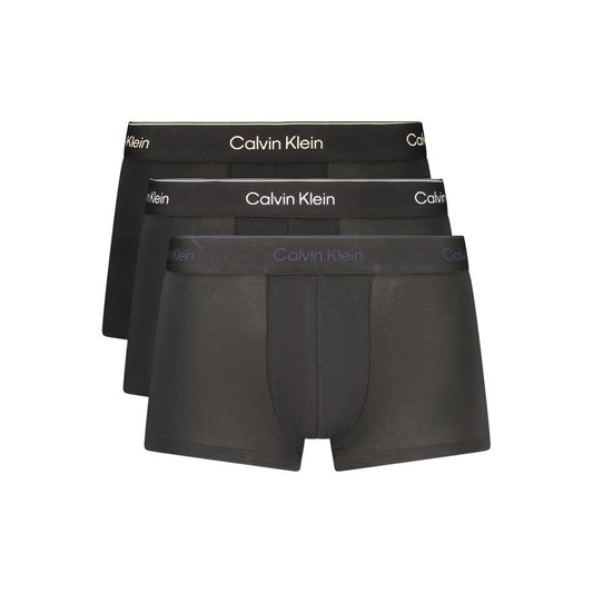 Underwear Boxer Shorts by Calvin Klein for men in stretch cotton black, blue, white & print presents a subtle silhouette as Men's Low-Rise Stretch Cotton Underwear Boxer Shorts, expertly tailored with a subtle fit for a premium look.