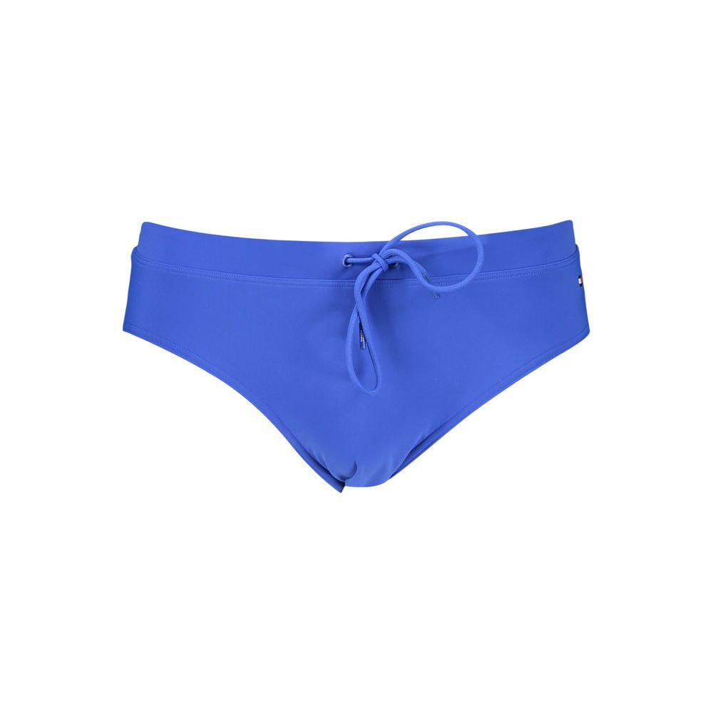 Swim Briefs by Tommy Hilfiger for men in nylon & polyester blue showcases a riviera-ready silhouette, expertly capturing the riviera-ready essence of the Men's Nylon & Polyester Swim Briefs design with a refined and riviera-ready finish.
