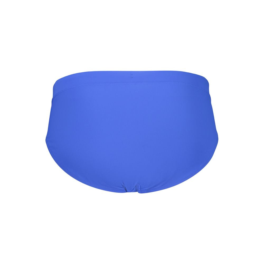 Swim Briefs by Tommy Hilfiger for men in nylon & polyester blue features a sleek silhouette from the Men's Nylon & Polyester Swim Briefs collection, showcasing a sleek cut designed for a sleek fit.