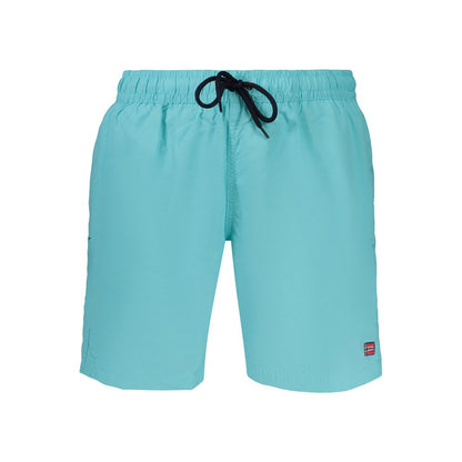 Swim Shorts by Norway 1963 for men in polyamide and blue showcases a sinuous silhouette, expertly cut for a sinuous fit as part of the Men's Polyamide Swim Shorts collection.