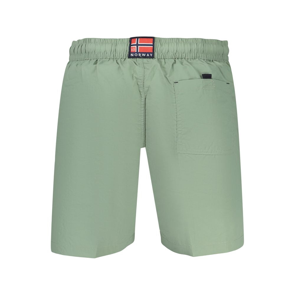 Swim Shorts by Norway 1963 for men in polyamide green & signature features an dramatic silhouette that defines the luxurious aesthetic and refined cut of the Men's Polyamide Swim Shorts.