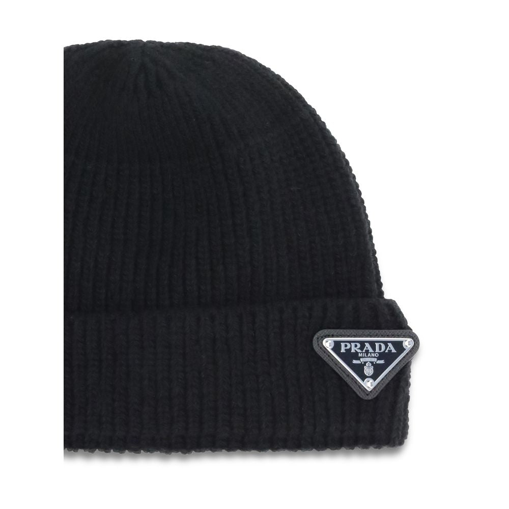 Beanie Hat by Prada for men in nylon wool & capra leather black presents a urban-chic silhouette, artfully capturing the essence of the urban-chic Nylon Wool & Capra Leather Beanie Hat design for a sophisticated look.