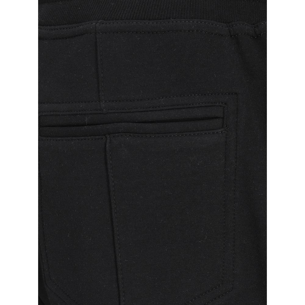Jogger Sweatpants by Brunello Cucinelli for men in polyamide silk cotton & capra leather black features an kinetic relaxed-fit & regular-fit and long with a , showcasing high-performance seamless for an kinetic look.