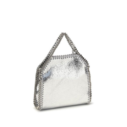 Compact Shoulder Bag by Stella McCartney for women in polyester leather silver & signature features a distinguished silhouette, showcasing a secure snap & magnetic and distinguished with versatile shoulder-strap & handle for a distinguished finish.