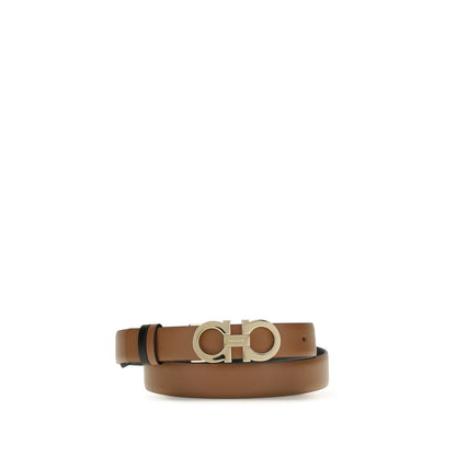 Belt by Ferragamo for women in bos taurus calf leather brown & signature presents a artisanal silhouette from the Gancini Bos Taurus Calf Leather Belt collection, showcasing an artisanal design and refined craftsmanship for a artisanal look.