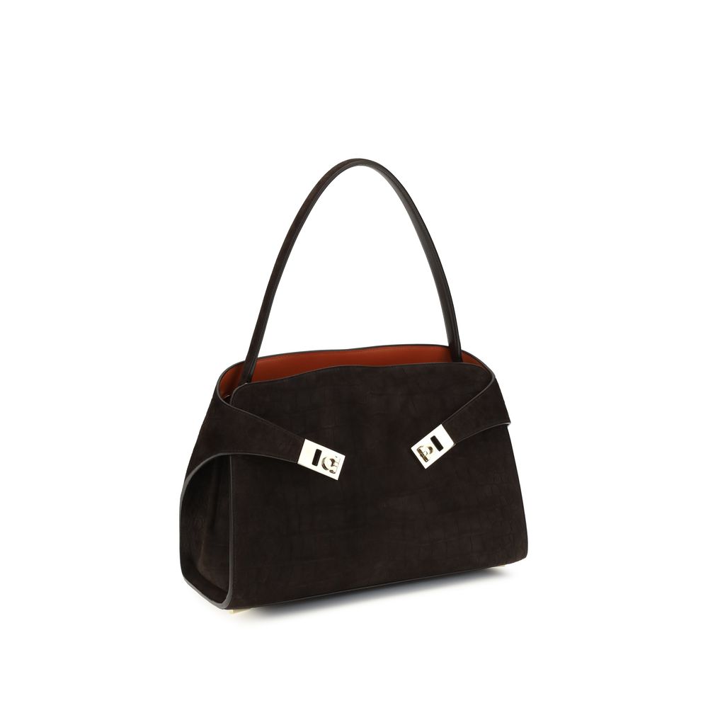 Shoulder Bag by Ferragamo for women in polyurethane & bos taurus suede calf leather brown, gold, signature-print & print showcases a enviable silhouette, artfully detailed with a secure zipper & buckle, organized , and versatile shoulder-strap for a enviable look.