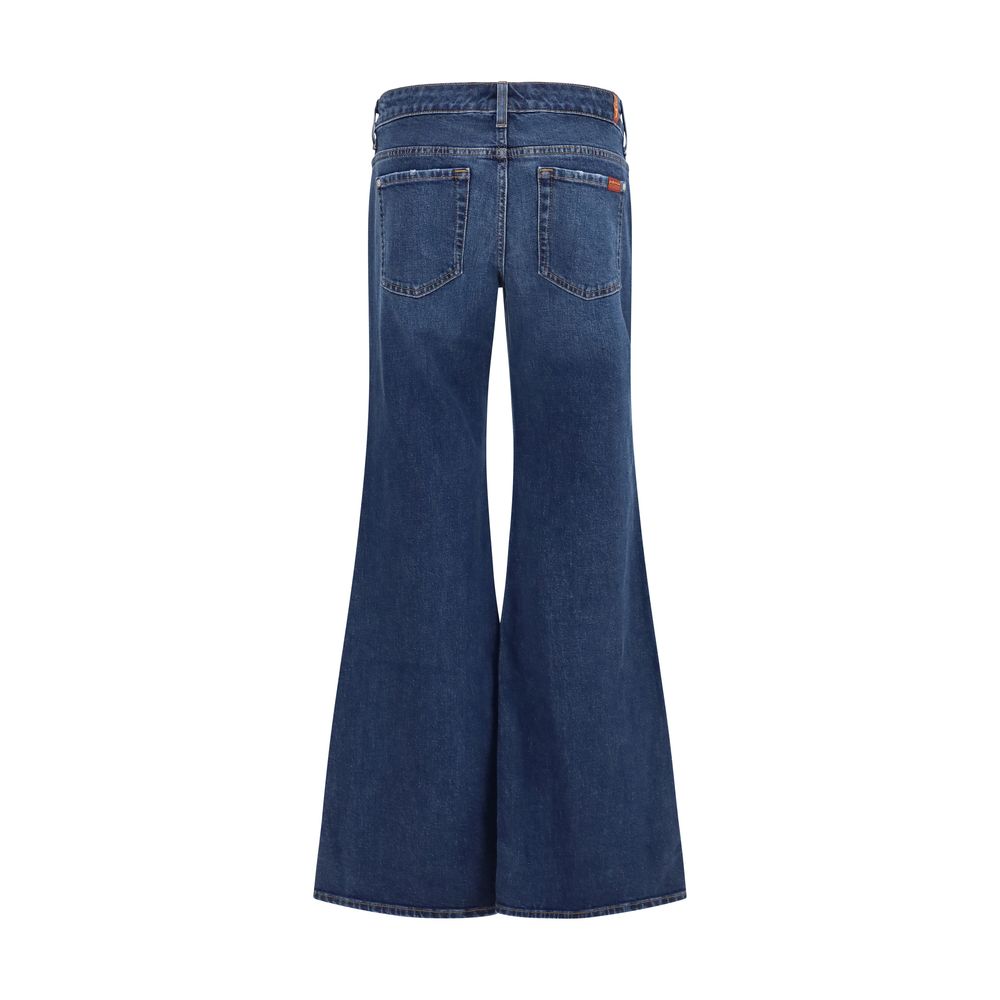 Jeans by 7FOR for women in stretch denim cotton blue, indigo & signature features an sartorial flared & slim and long with a low rise cut for a sartorial finish.