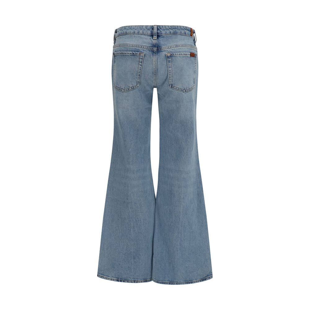 Jeans by 7FOR for women in stretch denim cotton blue features an sophisticated low rise and flared, relaxed-fit, wide & slim with a precise long, creating a sophisticated and sophisticated silhouette.
