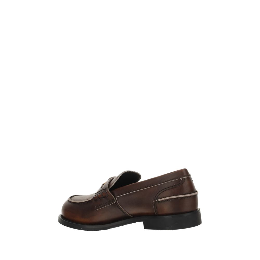 Loafer Slip-On Shoes by Miu Miu for women in bos taurus calf leather brown & signature features an dynamic silhouette from the Women's Bos Taurus Calf Leather Loafer Slip-On Shoes collection, defined by a dynamic and block-heel for a dynamic look.