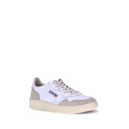 Sneakers by Autry for men in bos taurus calf suede leather white & signature features an timeless silhouette from the Men's Low Top Bos Taurus Calf Suede Leather Sneakers collection, showcasing a signature low-top style with an timeless finish.
