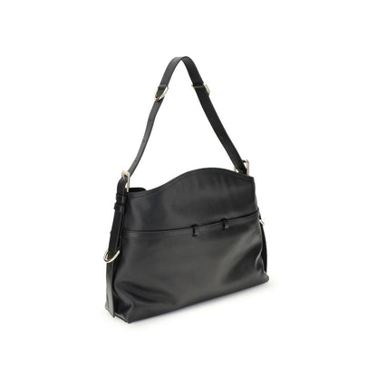 This Medium 2-in-1 Shoulder & Crossbody Handbag by Givenchy for women in bos taurus calf leather and black, gold & signature presents a sculptural silhouette featuring a secure , ample , and versatile crossbody-strap, shoulder-strap, adjustable-strap & handle for a sculptural finish.