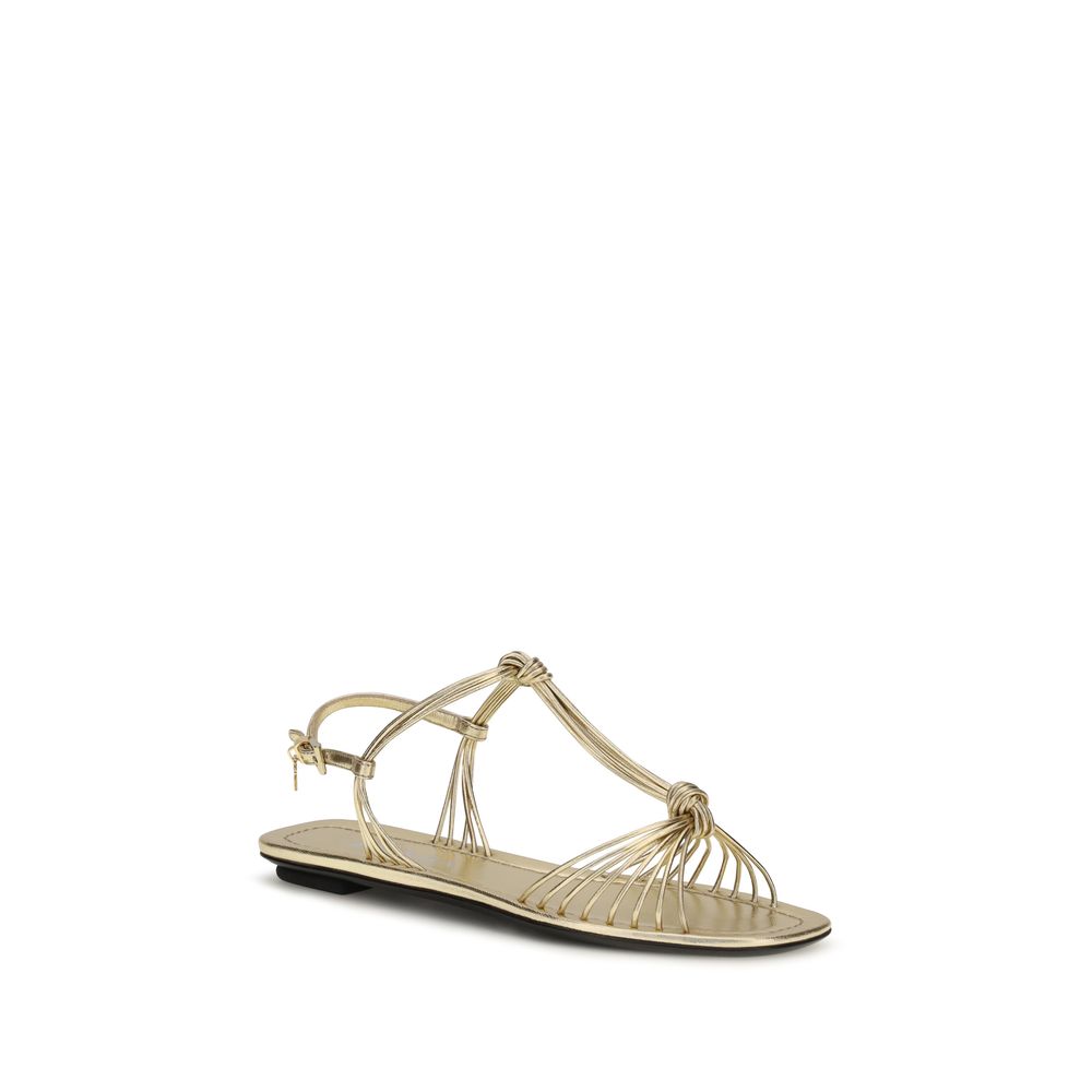 Flat Sandals by Prada for women in bos taurus nappa calf leather gold features an architectural design from the Women's Bos Taurus Nappa Calf Leather Flat Sandals collection, defined by a architectural flat and for a architectural finish.