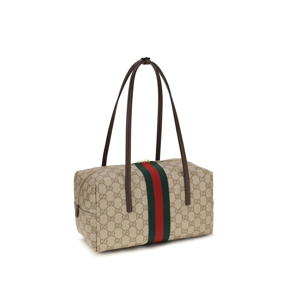 Medium Shoulder Boston Handbag by Gucci for women in cotton & leather beige, brown, green, red, signature & striped presents a ornamental silhouette, showcasing a secure zipper, ample , and versatile shoulder-strap for a ornamental finish.
