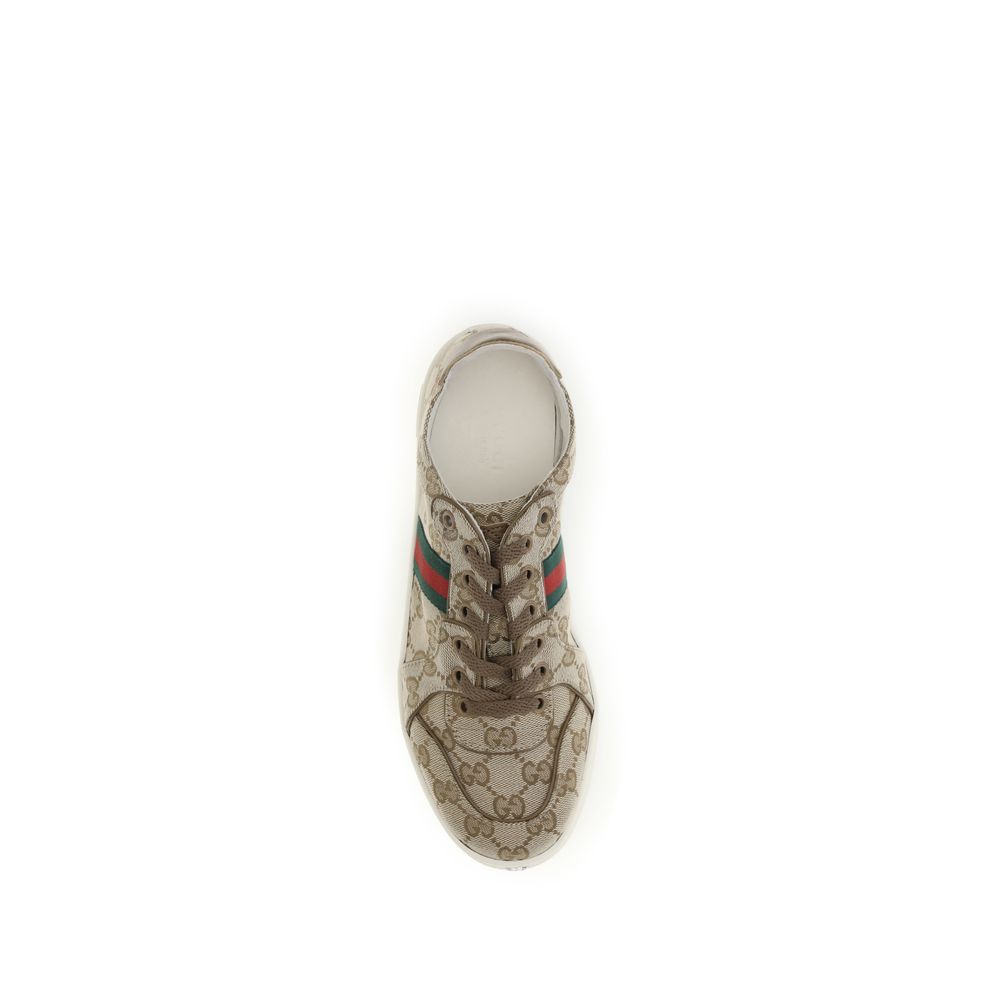 Athletic Sneakers by Gucci for women in leather & canvas beige, silver & signature features an effortless chic silhouette, showcasing the signature athletic style of the Gg Women's Athletic Leather & Canvas Sneakers collection with a truly effortless chic finish.