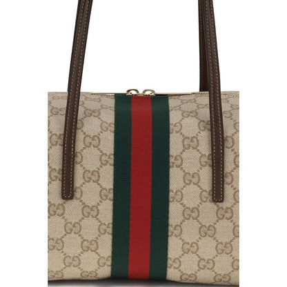 Medium Shoulder Boston Handbag by Gucci for women in cotton & leather beige, brown, green, red, signature & striped features a signature silhouette, showcasing a secure zipper and signature with versatile shoulder-strap for a sophisticated look.