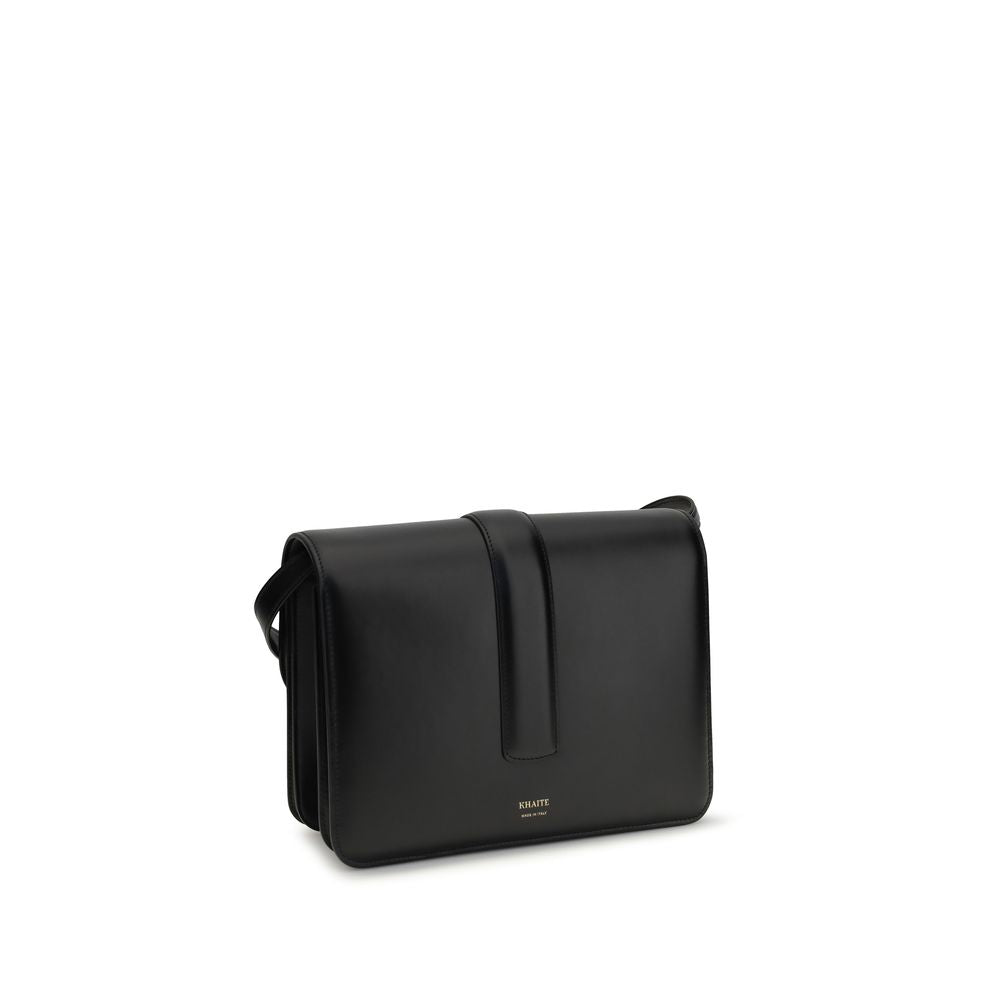 2-in-1 Shoulder & Crossbody Flap Bag by Khaite for women in bos taurus calf leather black & gold features a enviable silhouette, showcasing a secure flap, ample , and enviable crossbody-strap, shoulder-strap & adjustable-strap for a enviable finish.