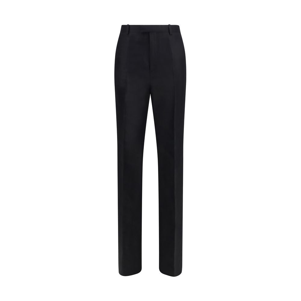 Trousers by Gucci for women in silk black presents a perennial silhouette, meticulously tailored with a regular-fit cut, long finish, and an elegant .