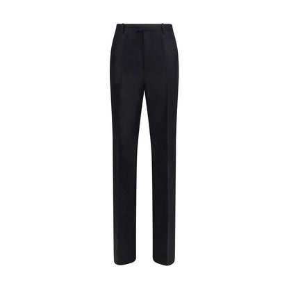 Trousers by Gucci for women in silk black presents a perennial silhouette, meticulously tailored with a regular-fit cut, long finish, and an elegant .